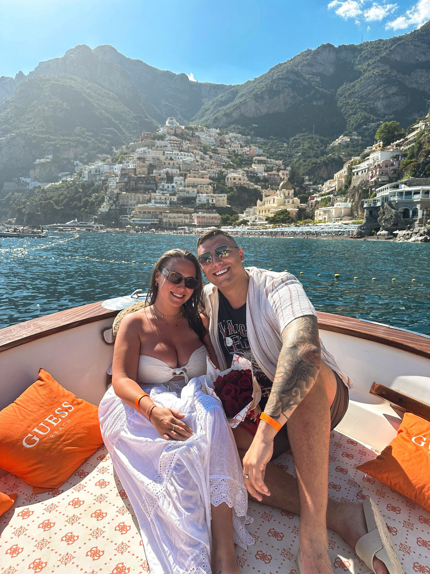 Victoria and Jamie on a boat off the Amalfi coast
