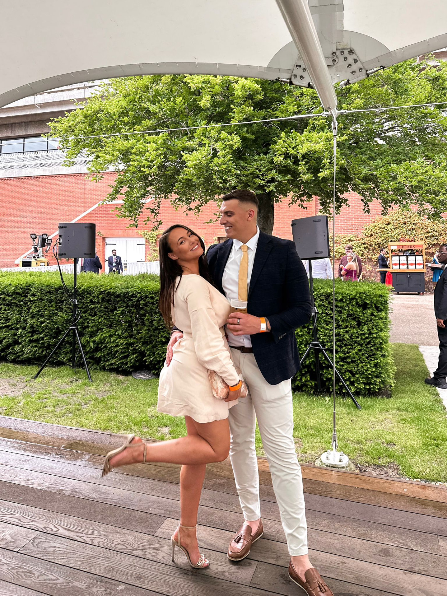 Victoria and Jamie dressed up at a summer race day