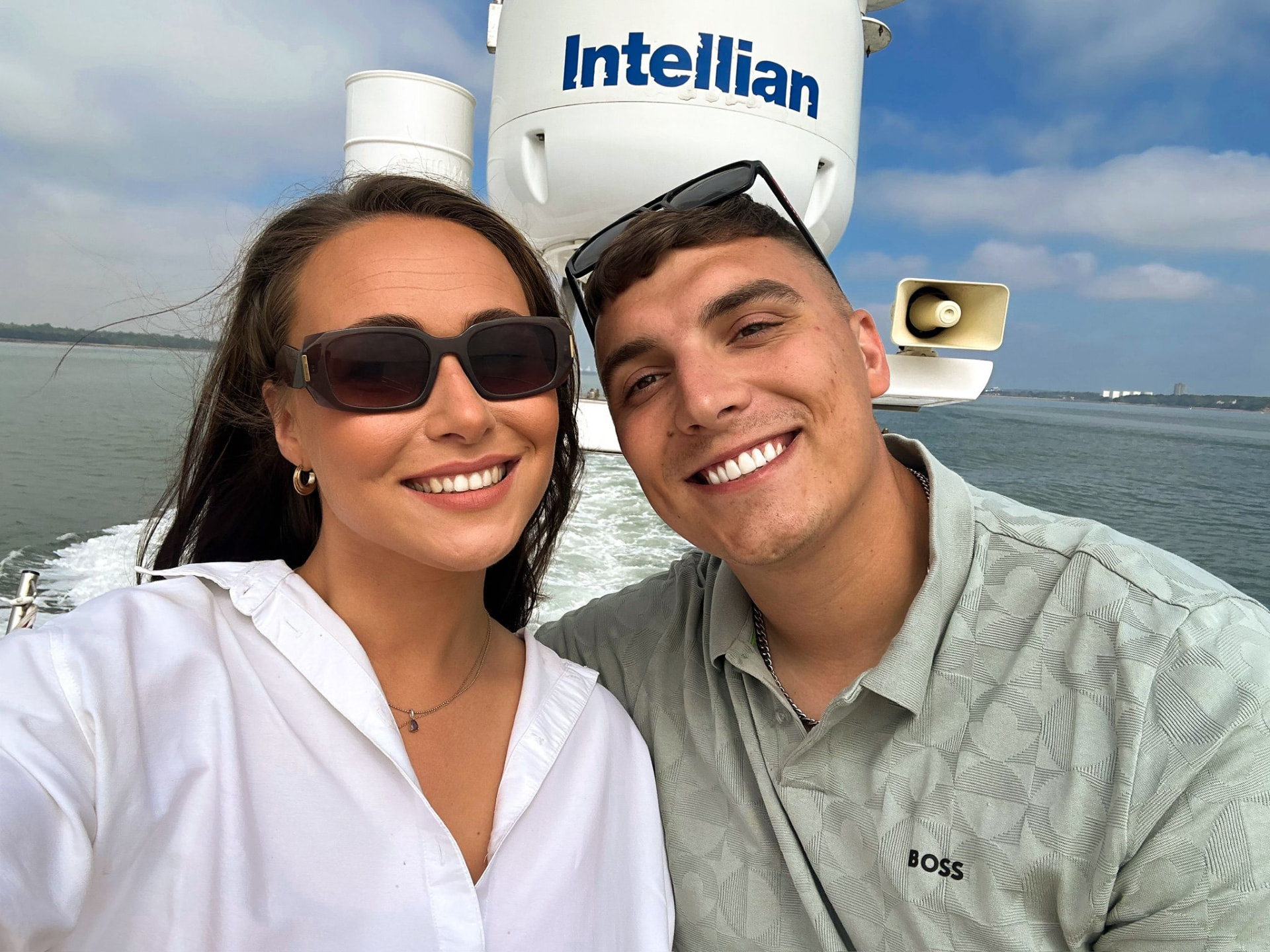 Victoria and Jamie on the water on a sunny day out